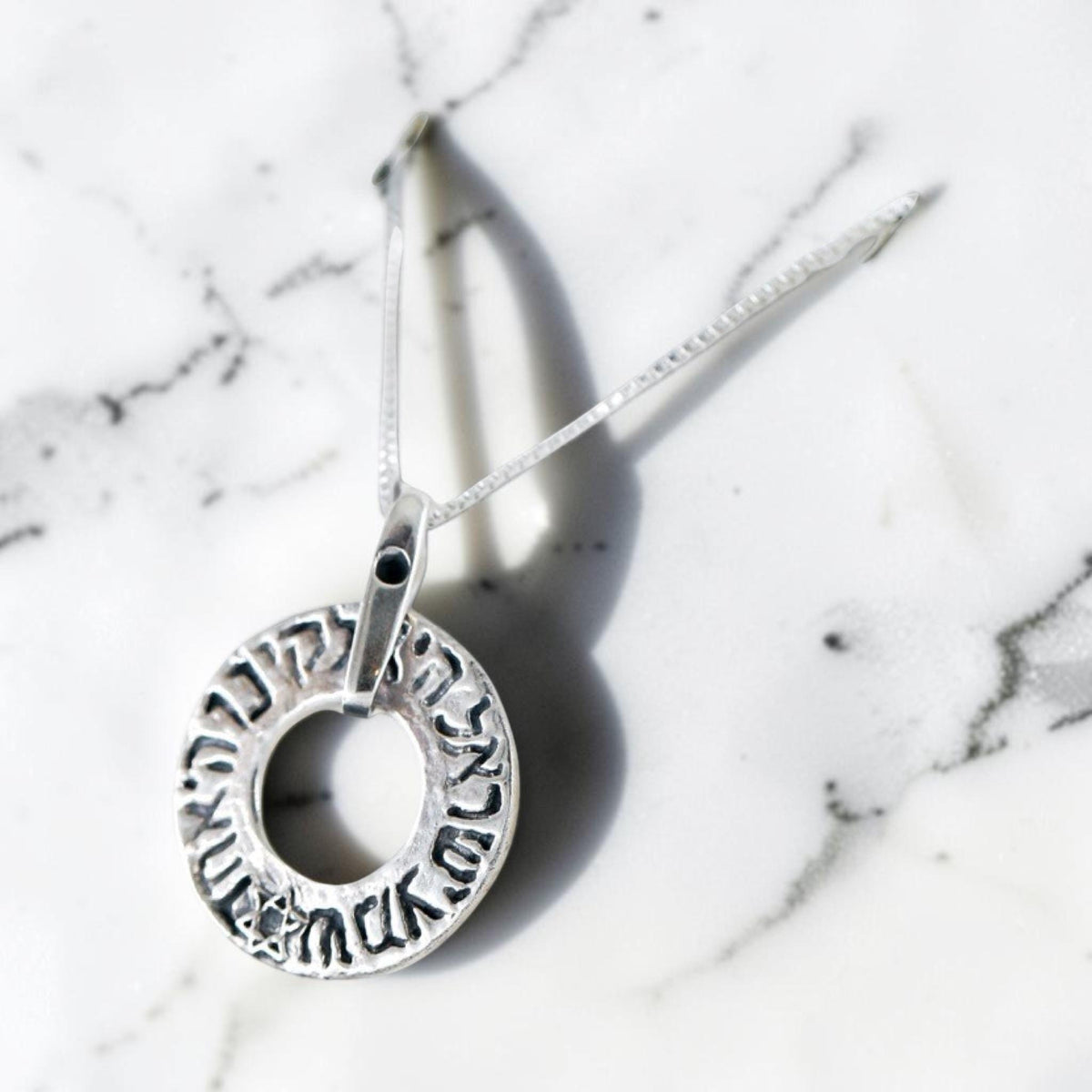 Collier bague étoile de David Shema