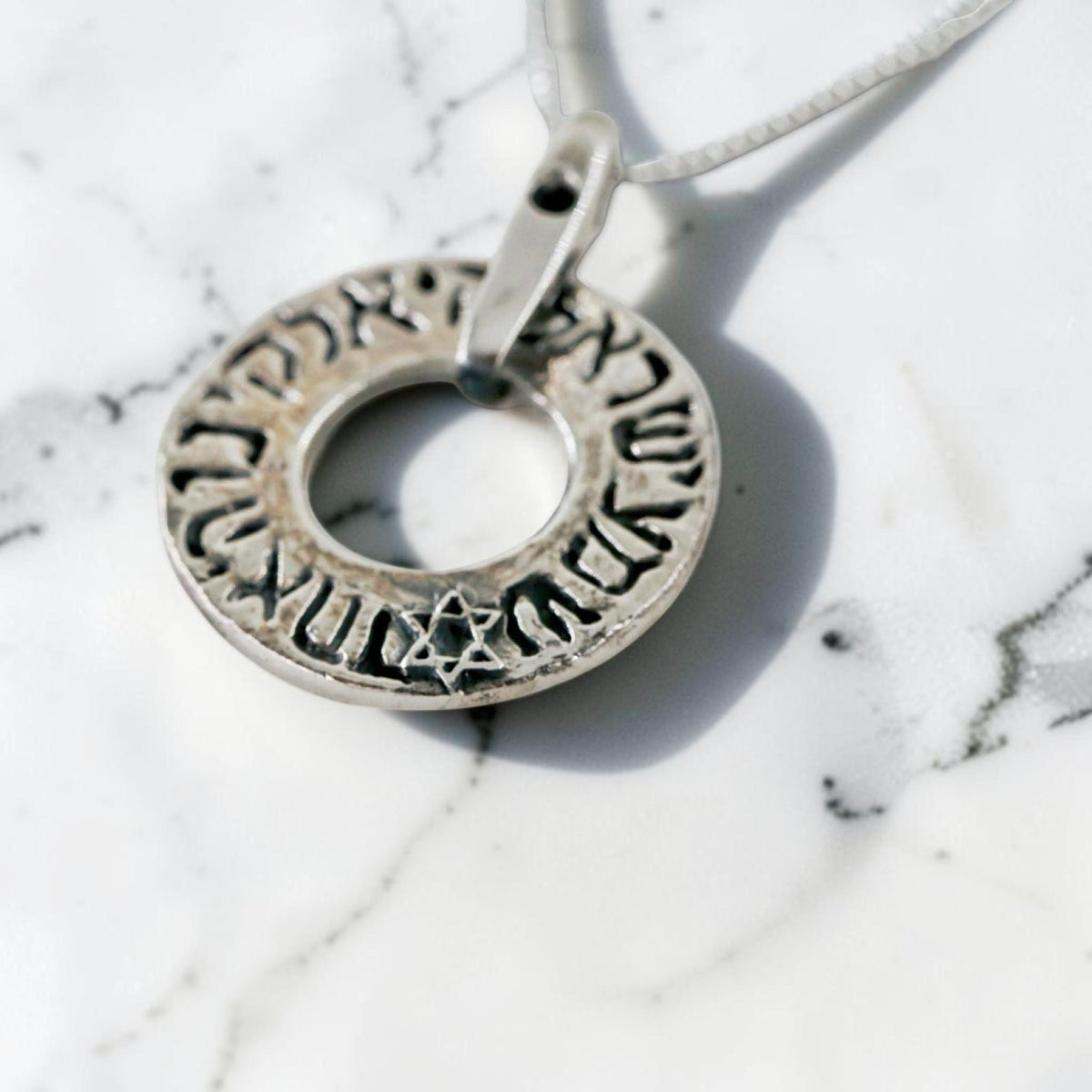 Collier bague étoile de David Shema