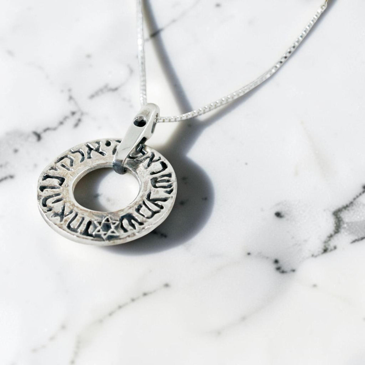 Collier bague étoile de David Shema